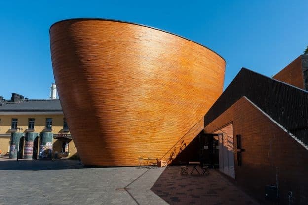 A multistory wooden oblong creates the most visually dramatic part of the ecumenical Kamppi Chapel of Silence in Helsinki.